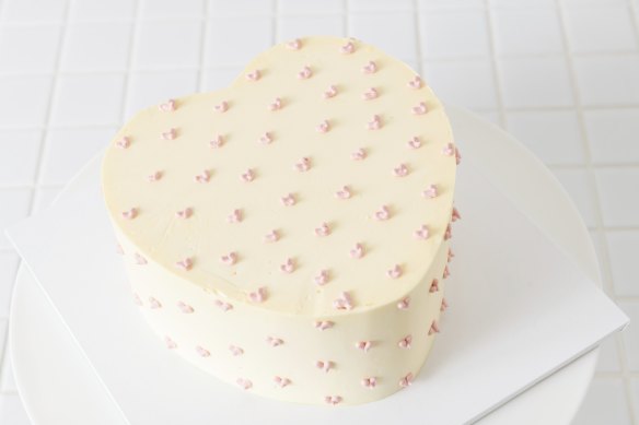 A heart-shaped custom cake.