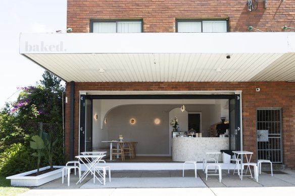 The Caringbah cake shop has three tables inside and three outside.