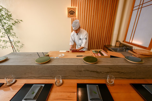 Matsu owner-chef Hansol Lee behind the counter of his four-seat restaurant.