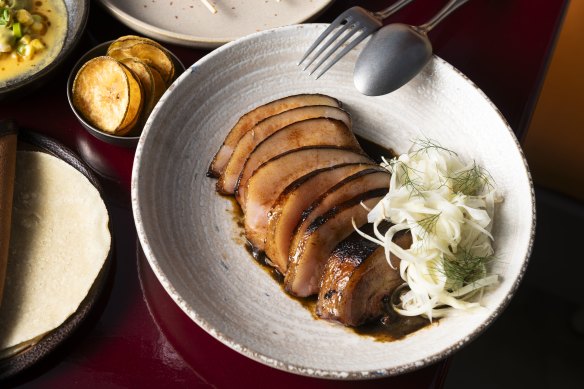Pork jowl carnitas in cola mole, with habanero pickled fennel.