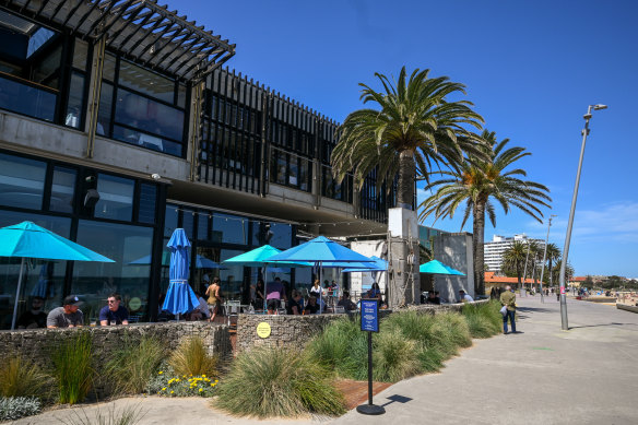 Outdoor tables are just metres from the foreshore trail and beach.