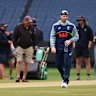 Steve Smith inspects the Test pitch on Christmas Day. 