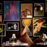 Bar Conexao’s moody, art-filled space was previously a photography studio.