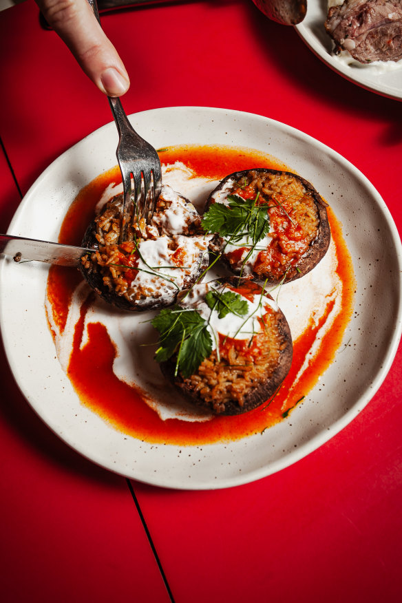 Stuffed portabello mushrooms with curry rice. 