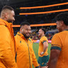 Taniela Tupou (centre) and teammates celebrate Australia’s win over Wales on Saturday night.