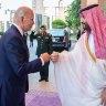Saudi Crown Prince Mohammed bin Salman, right, greets US President Joe Biden with a fist bump in Jeddah.