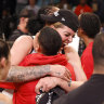 Cayla George celebrates her WNBA championship win with the Las Vegas Aces on Thursday.