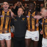 On a roll: Sam Mitchell and his Hawks are one happy family.