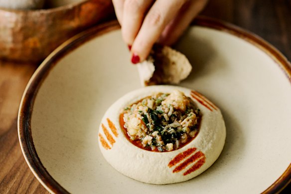 Chef Tom Sarafian’s signature hummus topped with spanner crab.