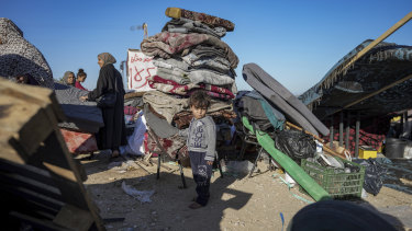 Palestinians arrive in central Gaza after leaving Rafah.