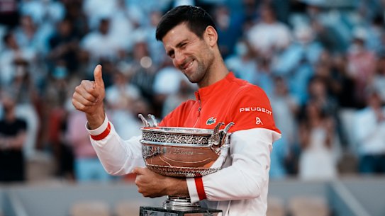 Thumbs up: Novak Djokovic will be able to defend his title at Roland Garros at this stage, organisers say.