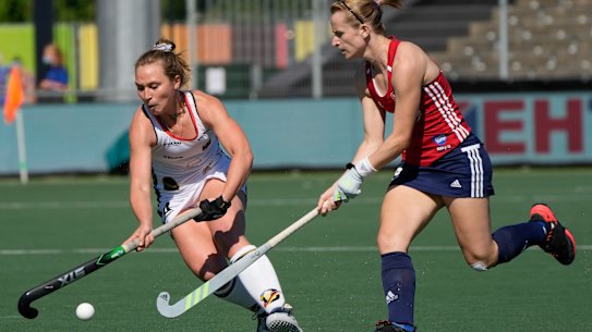 Germany’s Nike Lorenz, left, and England’s Elena Rayer vie for the ball during a match against England at the EuroHockey Championships 2021 in Amstelveen, Netherlands.