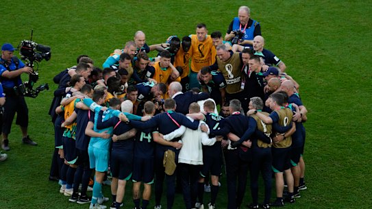A group hug for the Socceroos and for the nation.