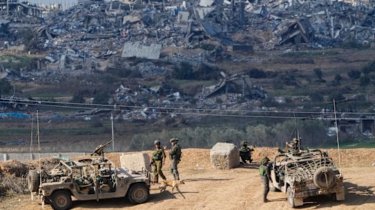 Israeli soldiers take up positions near the Gaza Strip border in southern Israel.