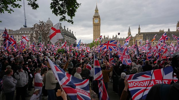 Protesters gather at Parliament Square during the far right Unite the Kingdom march in London on Saturday.