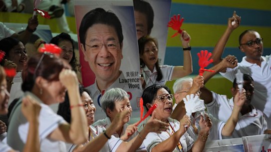 Incumbent Prime Minister Lawrence Wong celebrates the win.