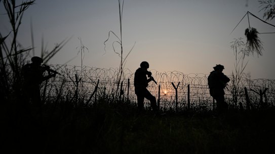 Indian soldiers patrol along the highly militarised Line of Control that divides Kashmir region between India and Pakistan.