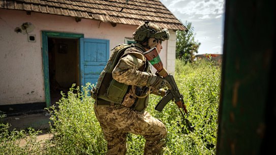 A Ukrainian serviceman of “Fireflies” reconnaissance team takes his position at the frontline in Mykolaiv region.