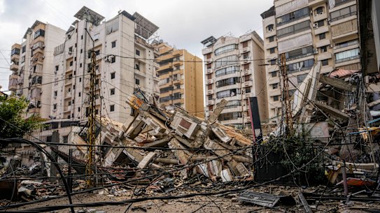 A damaged building is seen at the site of an Israeli airstrike in Beirut.