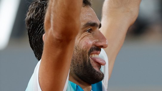 Former US Open champion Marin Cilic celebrates his upset Roland Garros win over Daniil Medvedev.