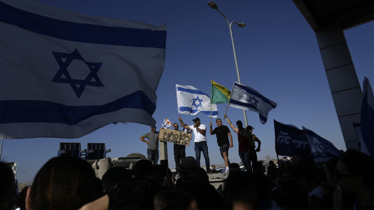 Protesters gather in support of soldiers being questioned for detainee abuse, outside of the Sde Teiman military base.