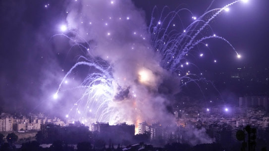 Flames and smoke rise from an Israeli airstrike in Beirut, Lebanon.