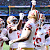 49ers celebrate scoring a touchdown.