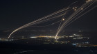 The Israeli Iron Dome air defence system fires to intercept an attack from Lebanon, as seen from the Israeli-annexed Golan Heights on Sunday.