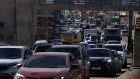 Displaced residents sit in traffic as they return to their villages south of Beirut.