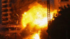 Thick smoke and flames erupt from an Israeli airstrike on Tayouneh, Beirut.