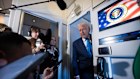 President Donald Trump speaks to reporters aboard Air Force One as he travels from Tokyo, Japan, to South Korea, Wednesday, Oct. 29, 2025. (AP Photo/Mark Schiefelbein)