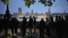 People queue to pay their respect to the late Queen Elizabeth II. 