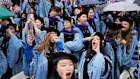 Graduates cheer during Columbia University commencement ceremony in Manhattan.