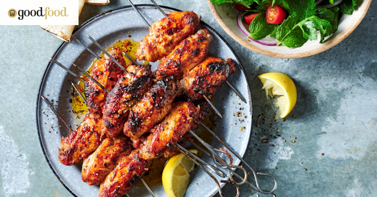 Kanat chicken wings with sumac, tomato and onion salad