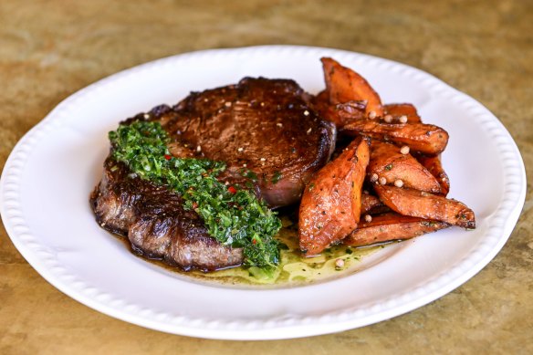 Scotch fillet with chimichurri and roasted buttered carrots.