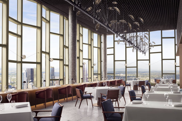 The dining room has soaring windows with widescreen views.