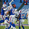 Matt Milano (No.58) celebrates with Bills teammates after their drought-breaking win.