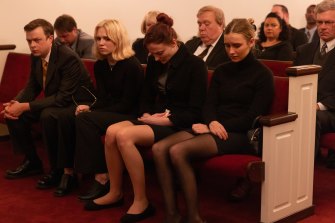 A family in mourning (left to right): Clayton Peterson (Dane DeHaan), Martha Ratliff (Odessa Young), Margaret Ratliff (Sophie Turner), and Caitlin Atwater (Olivia DeJonge).