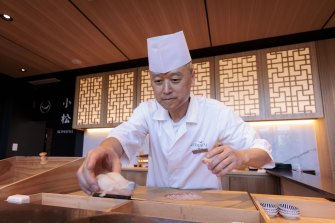 Owner and chef Yang Joan Jang prepares sushi at his Komatsu omakase restaurant in Rhodes.