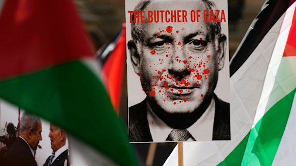 A poster carried in a pro-Palestinian rally in Sydney.