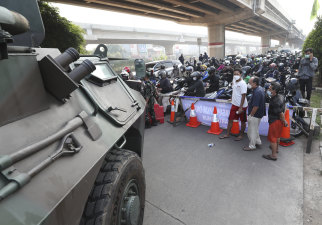 An armoured vehicle parked at a checkpoint in Jakarta on Monday.