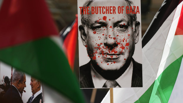 A poster carried in a pro-Palestinian rally in Sydney.