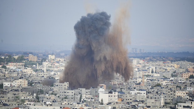 Smoke rises from an explosion caused by an Israeli airstrike in the Gaza Strip on Saturday. 