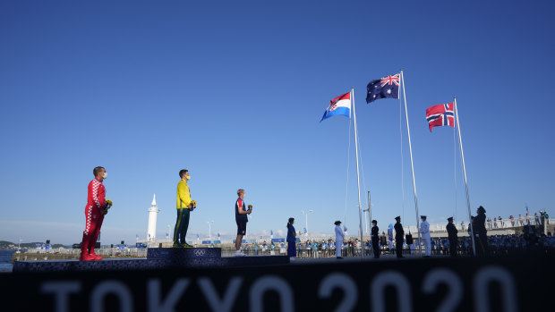 Matt Wearn stands atop the Olympic podium.