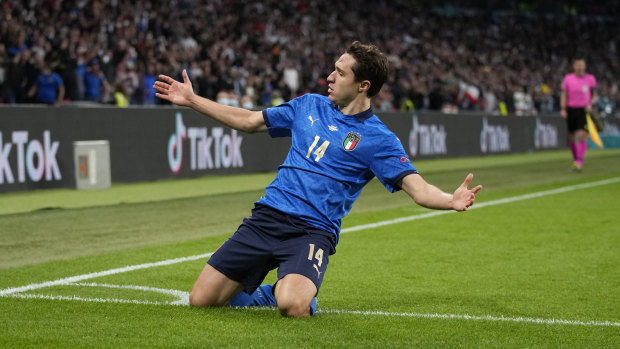 Italy’s Federico Chiesa celebrates scoring his side’s opener in the Euro 2020 semi-final against Spain.