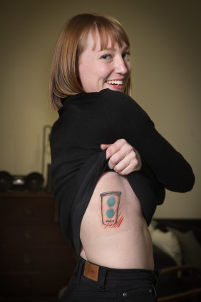 Harriet Noall, 25, with her fresh tattoo. 