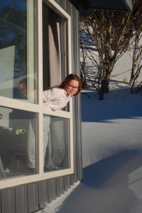 Emily peers out her window at Numbananga Lodge to find a fresh dump of snow.