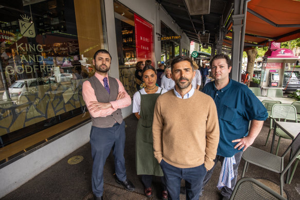 Luca Sbardella (front), the co-owner of King and Godfree, with staff members on Lygon Street.