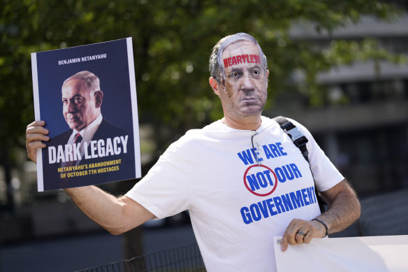 A protester demonstrates near The Watergate Hotel.