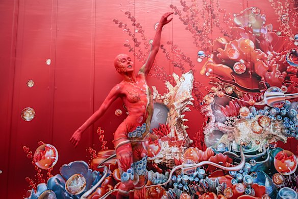 A camouflaged body paint performer greets guests to the Penfolds ‘Venture Beyond’ underwater wonderland marquee.